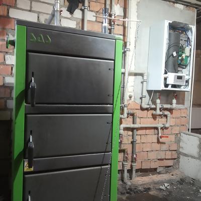 Монтаж твердотопливного котла с дублирующим электрокотлом